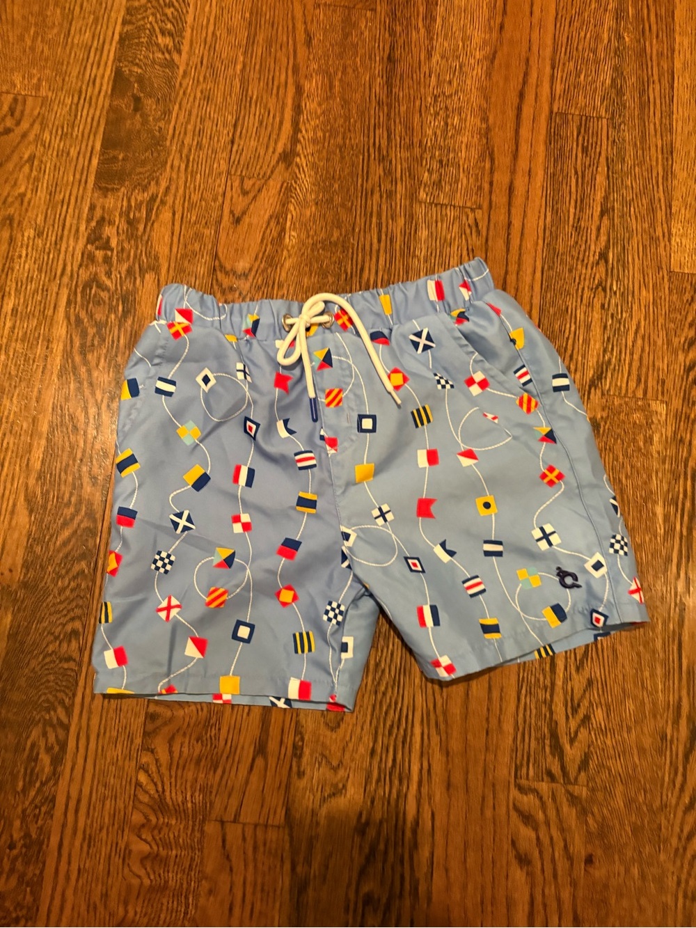Light Blue Kids Swim Trunks with Nautical Flag Print size 8